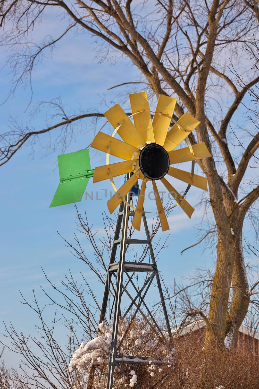 A small Windmill or Wind Turbine in a Rural Setting by markvandam