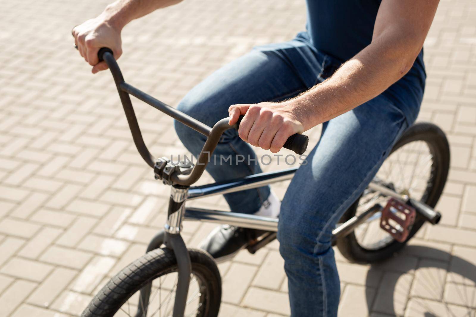 Young urban bmx racer in the city. by StudioPeace