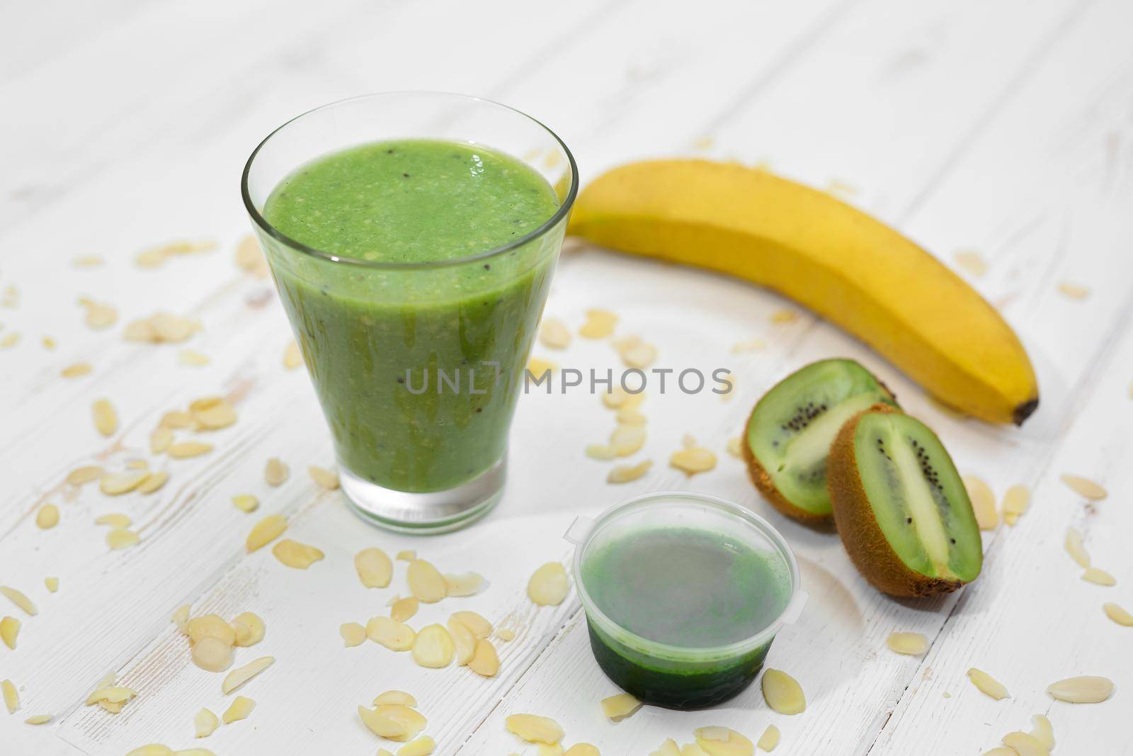 Whitegrass smoothie, banana and kiwi. Detoxification Wheat