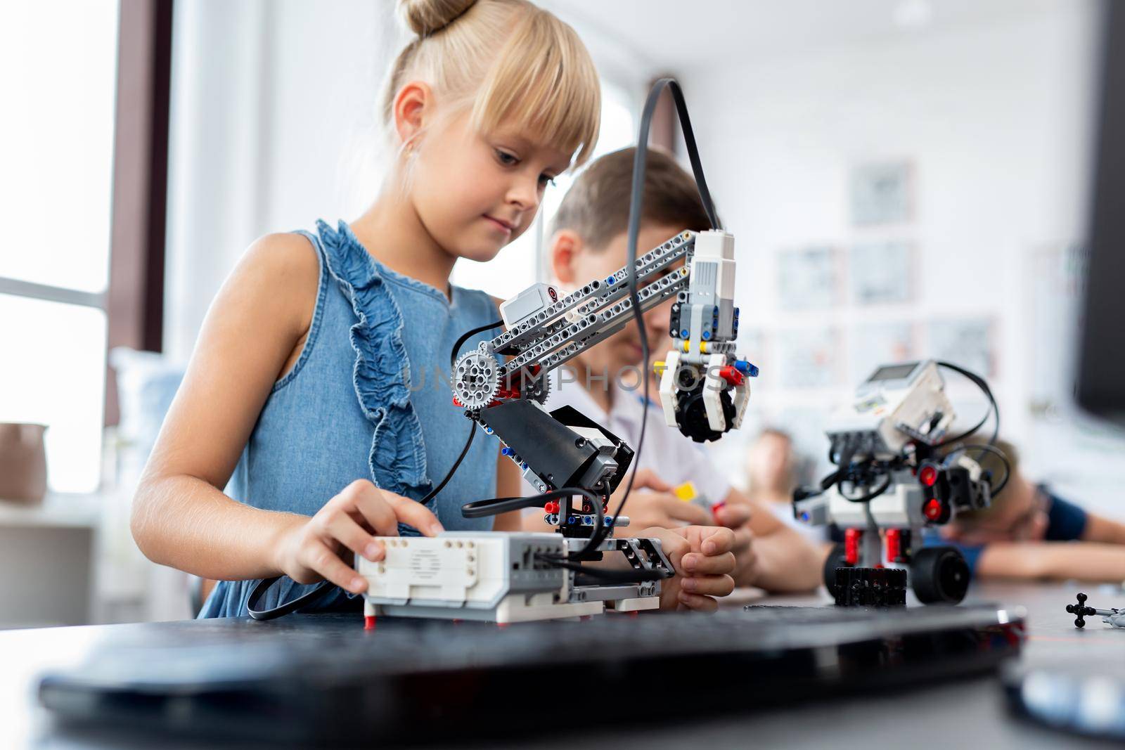 Children in a robotics class in the classroom