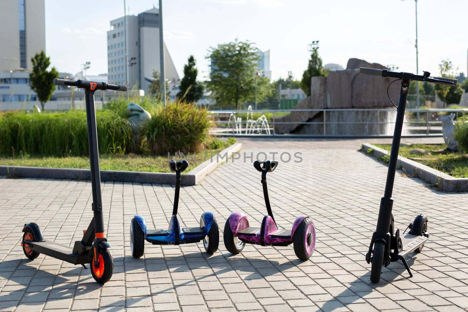 Electric scooters and a gyro scooter for rent. Urban transport. by StudioPeace