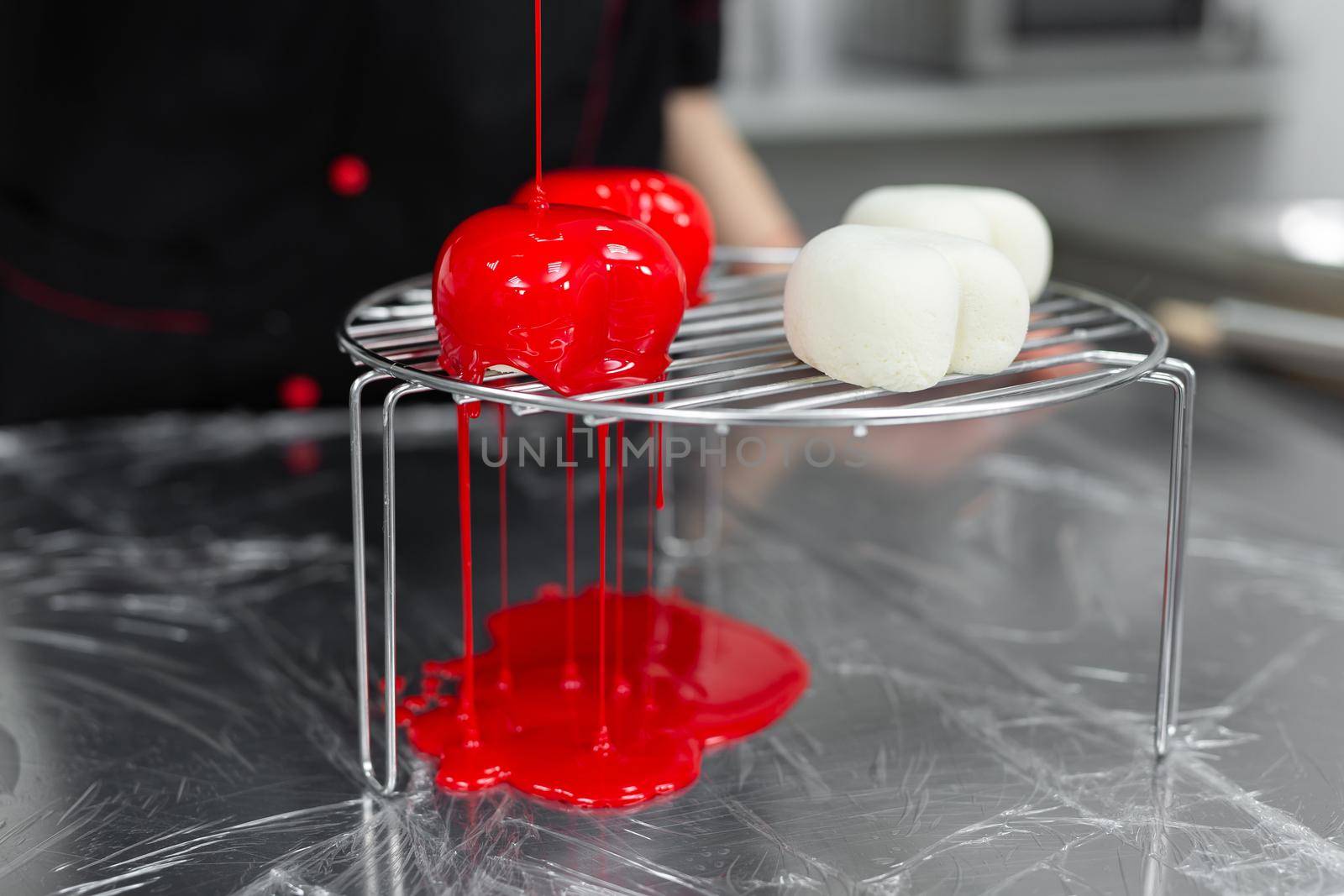 Process of making mousse cake with mirror glaze. Frozen mirror icing on the cake by StudioPeace