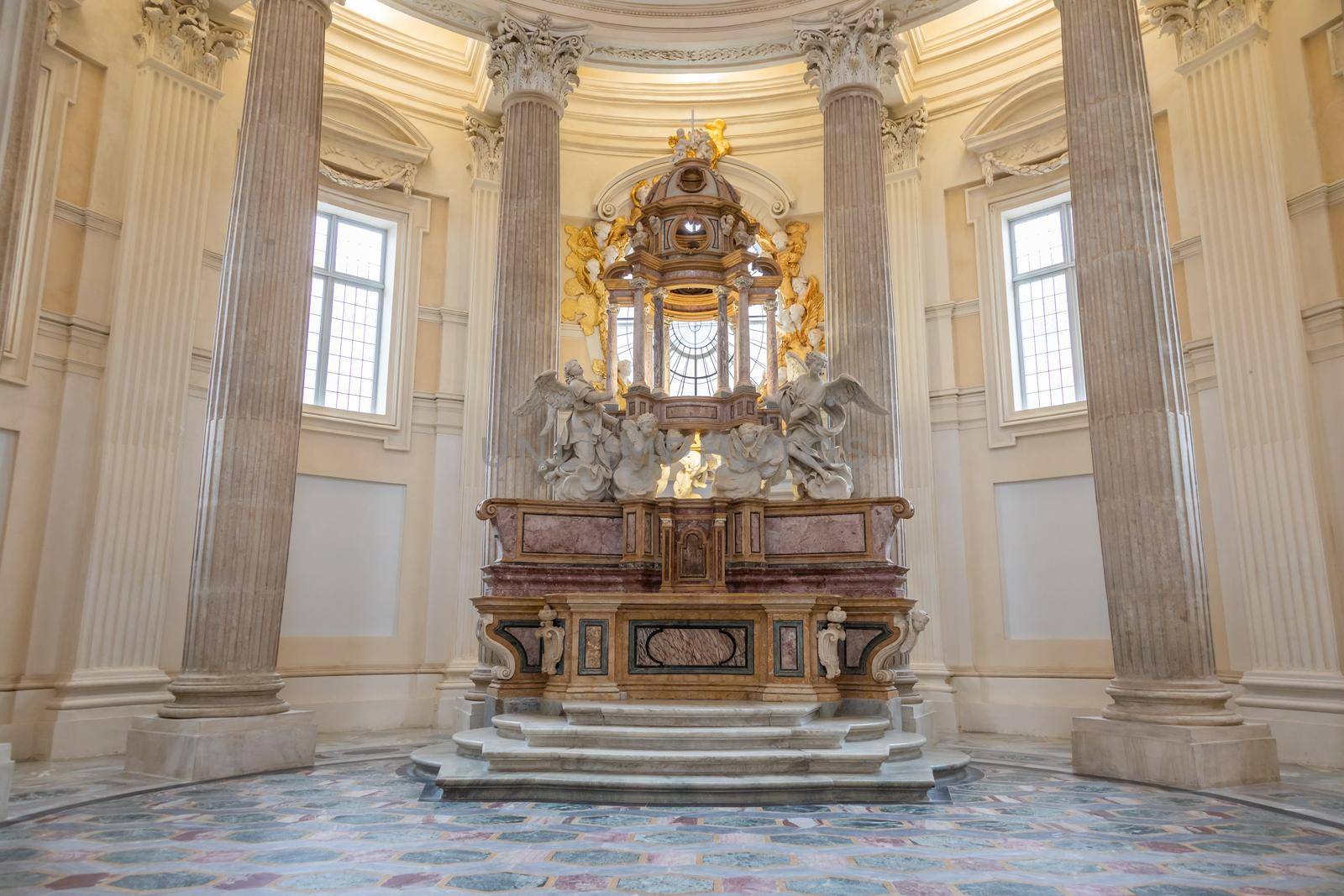 VENARIA REALE, ITALY - Circa January 2022: Baroque catholic church altar. Old interior religious building.