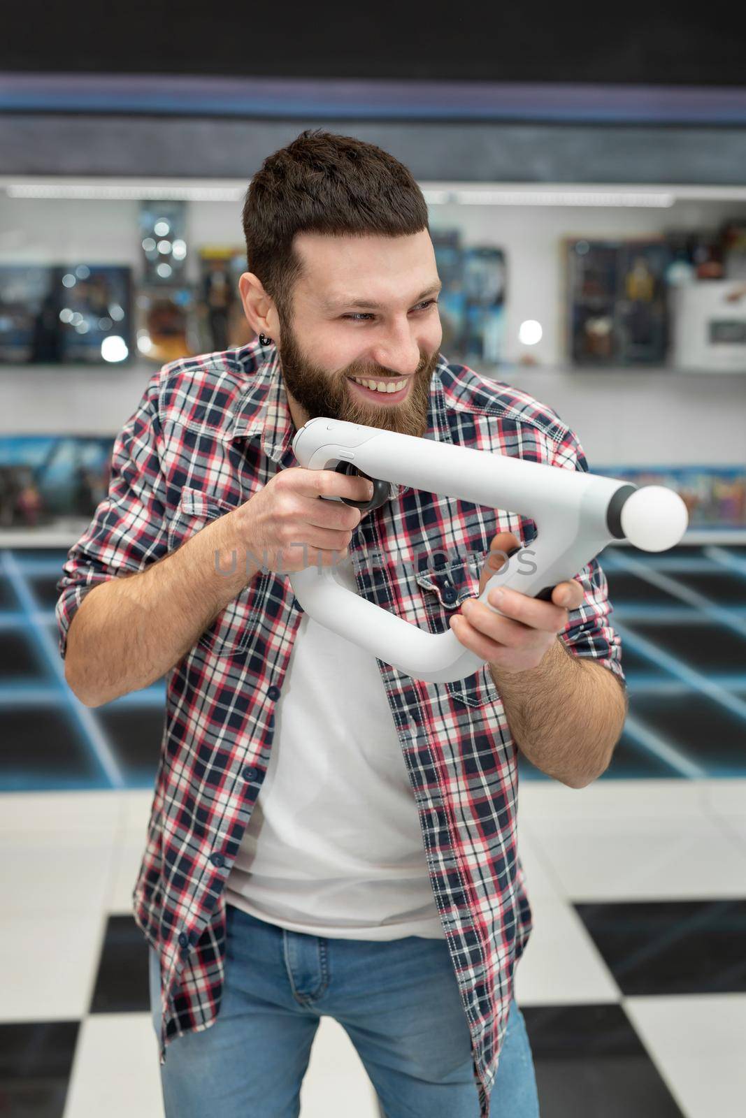 Young man plays a video games console VR with an controller.