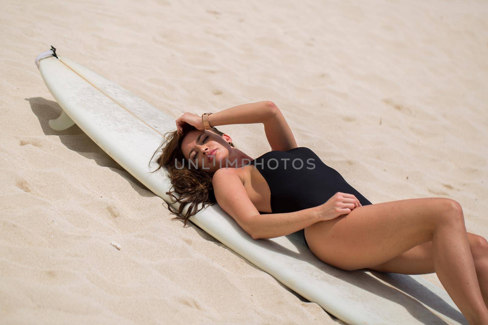 Beautiful sexy surfer girl on the beach. by StudioPeace