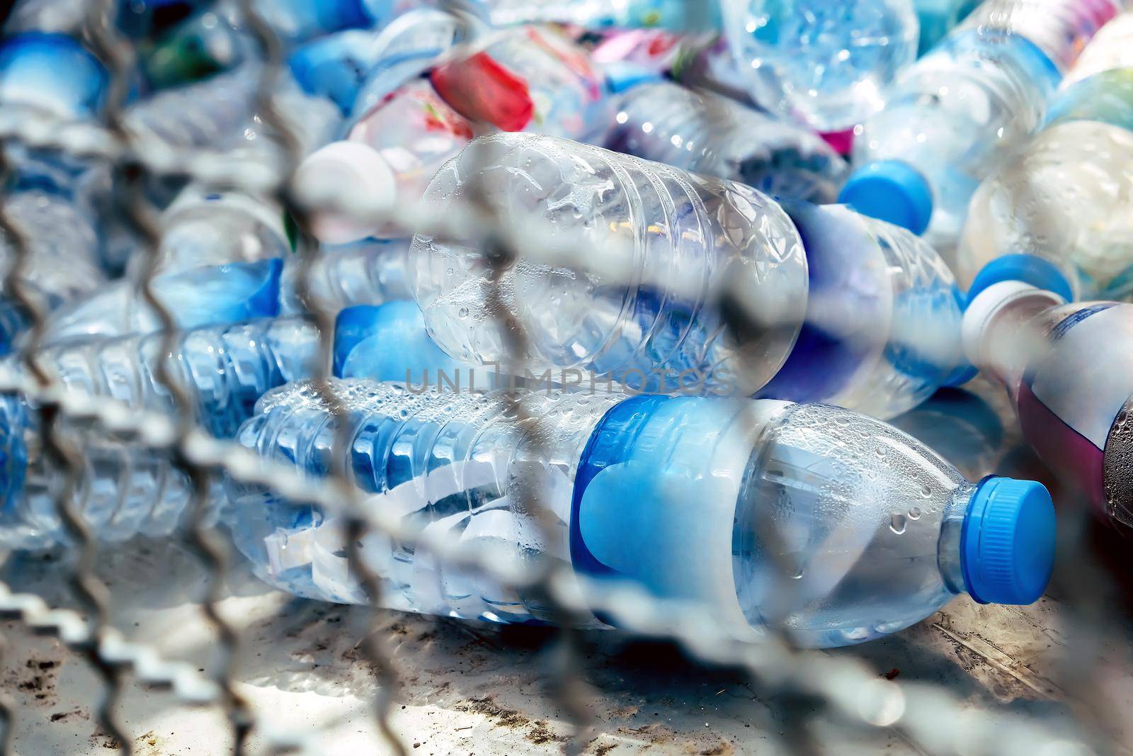 Plastic bottles and containers prepared for recycling by ponsulak