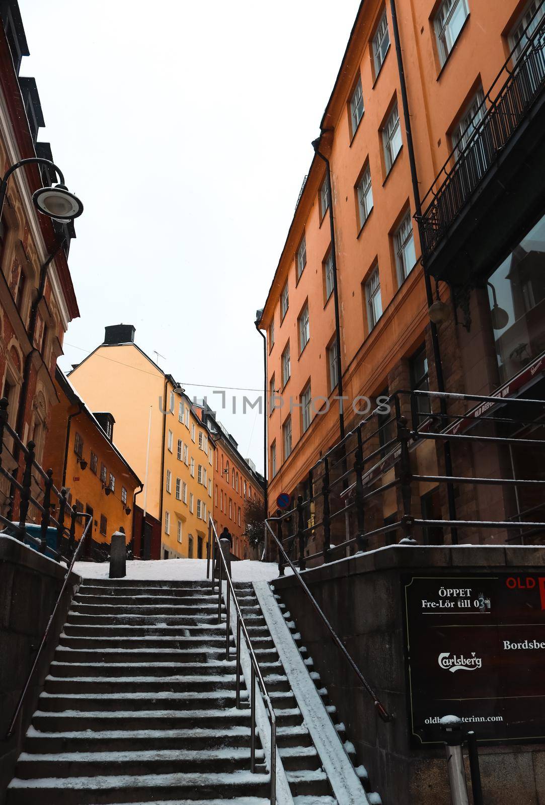 High quality shot of a snowy, colourful, traditional Sodermalm street, south Stockholm, Sweden.