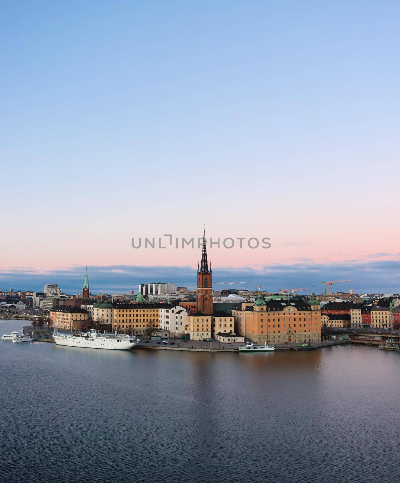 Colourful Swedish buildings on the famous 'Riddarholmen' islet of Gamla Stan, Stockholm, Sweden. by olifrenchphoto