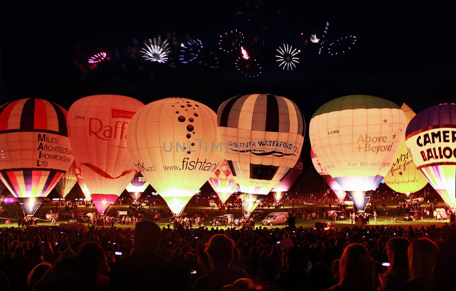 Bristol balloons lined up for the festival fireworks celebration at night, Bristol, UK. High quality photo.
