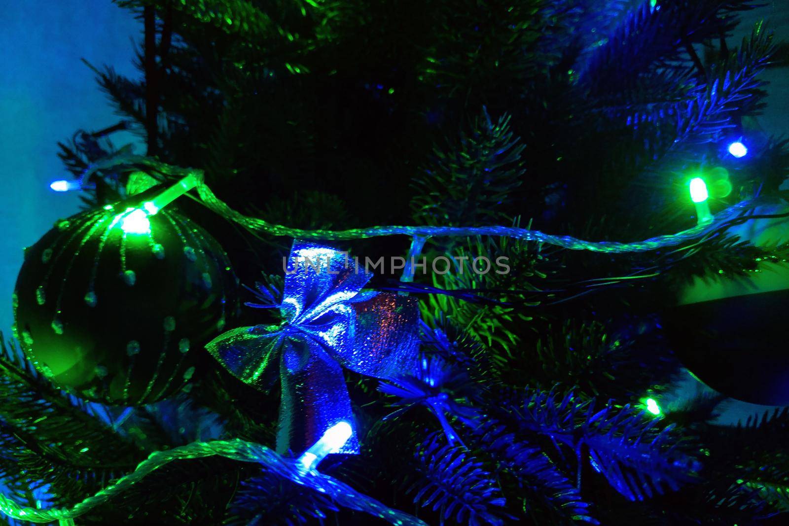 Bright light and decoration on a Christmas tree. by kip02kas