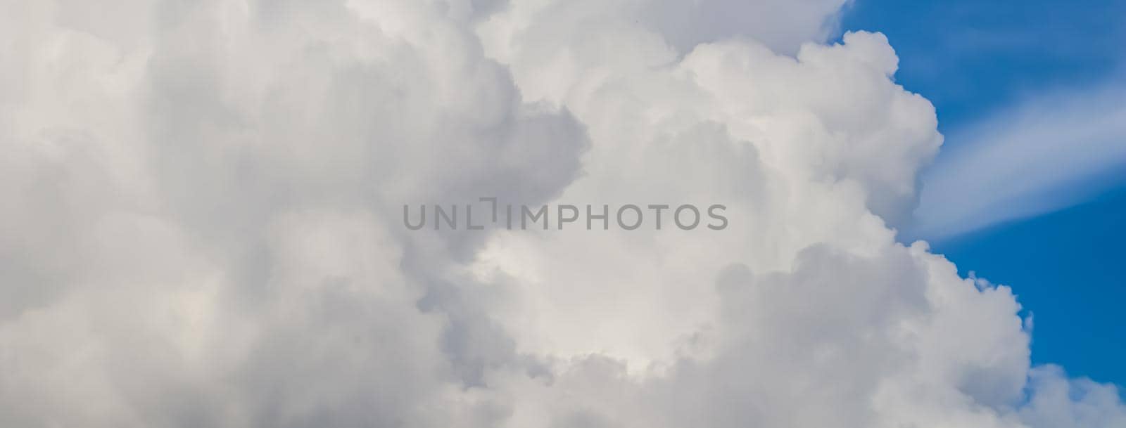 White clouds on blue sky background. Natural backdrop