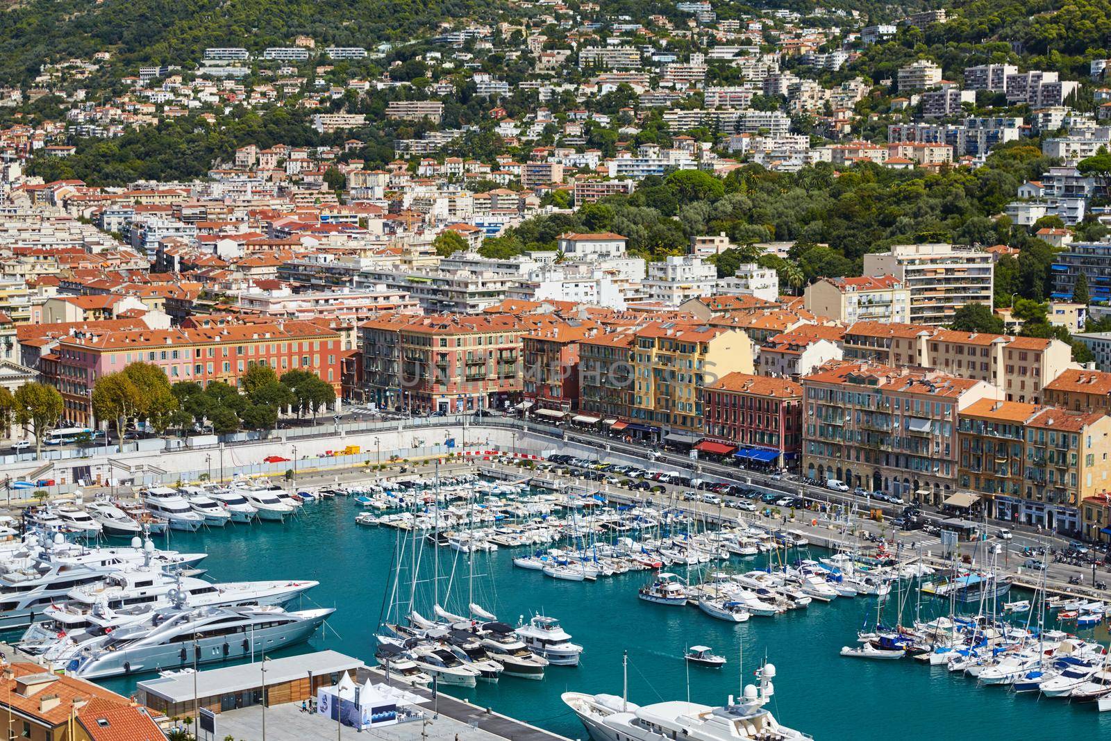 Monaco, Monte-Carlo, a lot o motor boats are moored in port at sunny day, mooring ropes go into the azure water, prows of motor boats in a row, boat railings . High quality photo