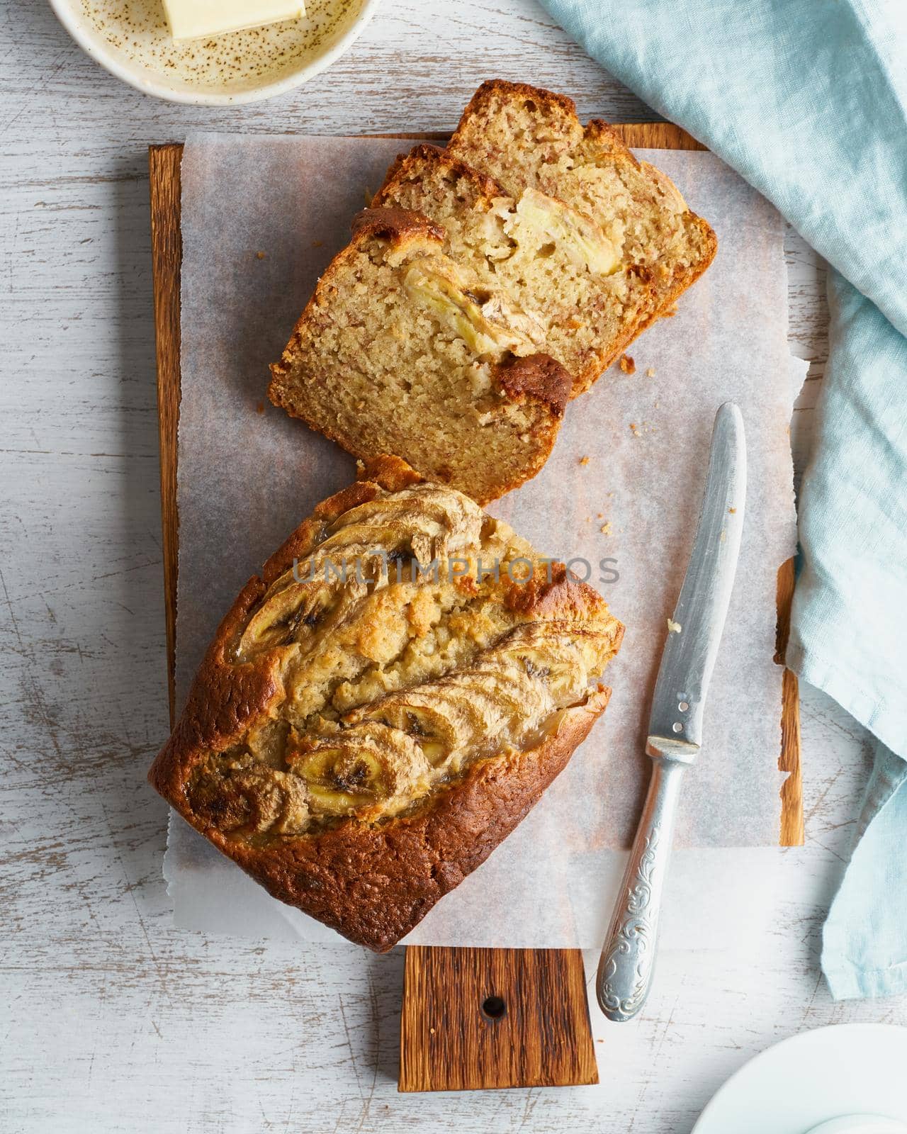 Banana bread. Cake with banana, traditional american cuisine. Slice of loaf. Top view, close up.