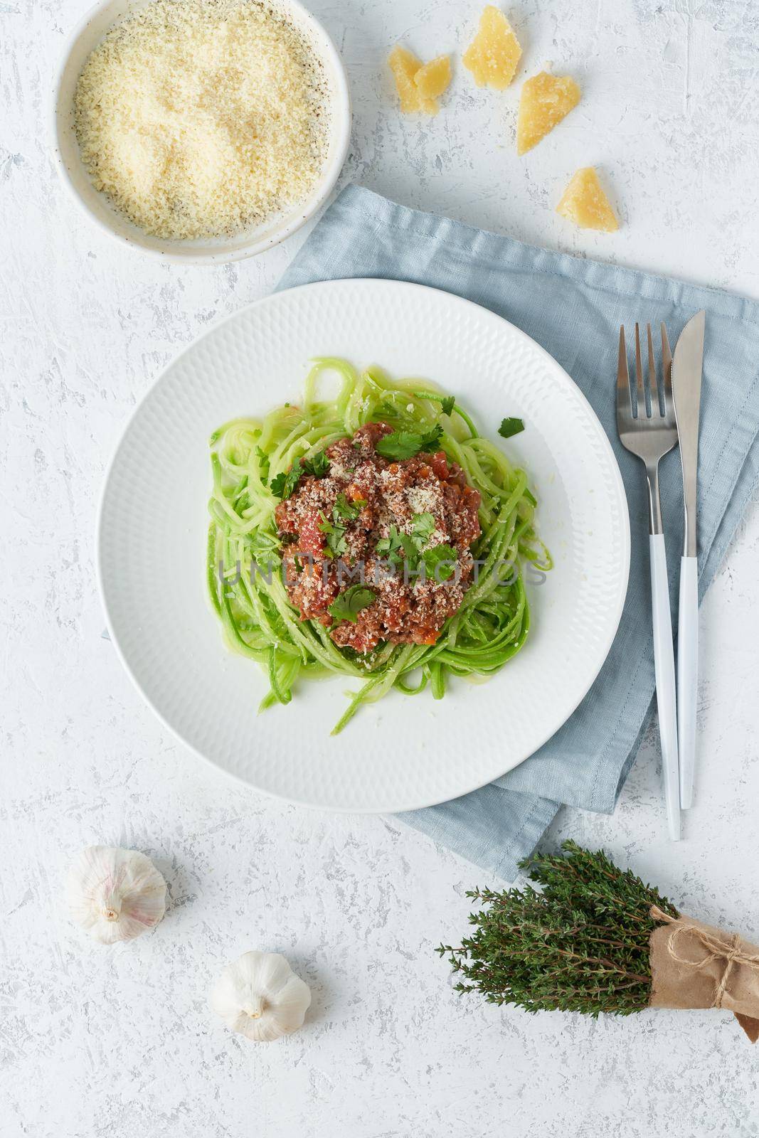 Keto pasta Bolognese with mincemeat and zucchini noodles, fodmap, lchf, low carb. Vertical by NataBene