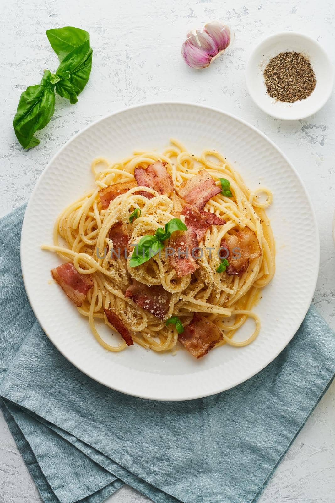 Carbonara pasta. Spaghetti with pancetta, egg, parmesan cheese and cream sauce by NataBene