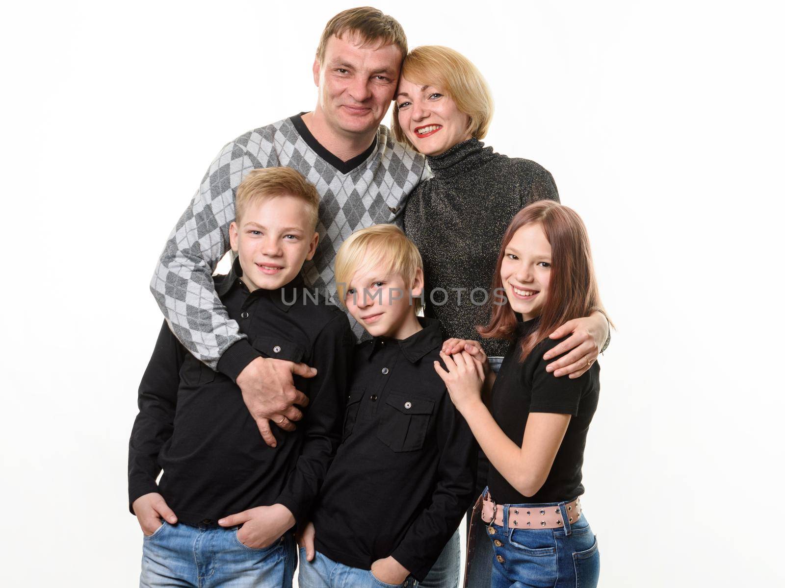 Happy growing up large family, two teenager boys and a girl, isolated on white background a