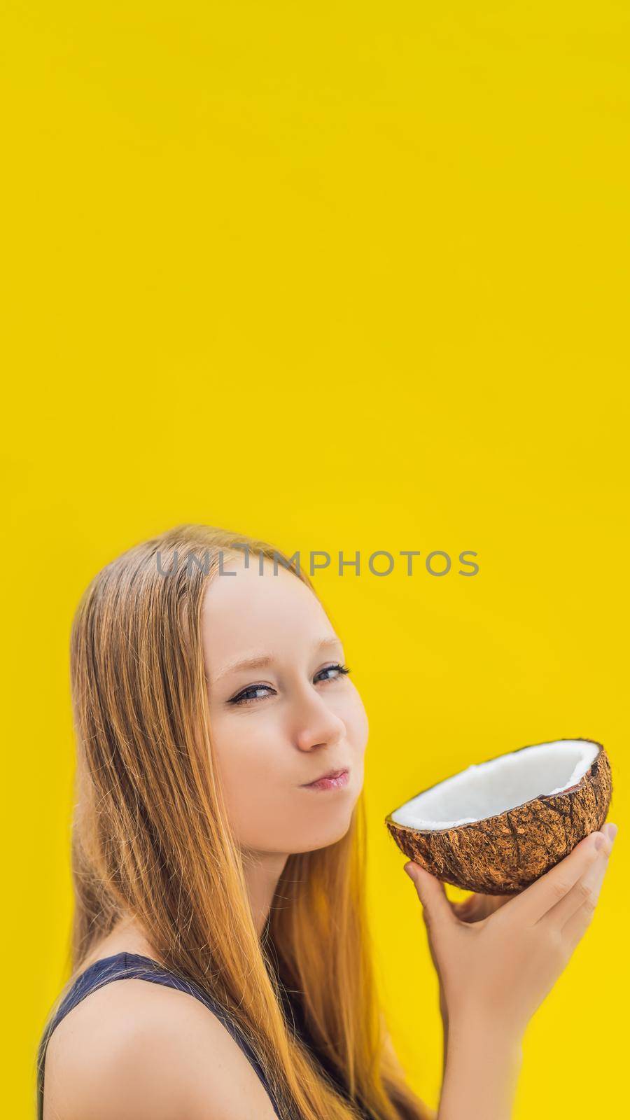 Young woman doing oil pulling over yellow background. VERTICAL FORMAT for Instagram mobile story or stories size. Mobile wallpaper
