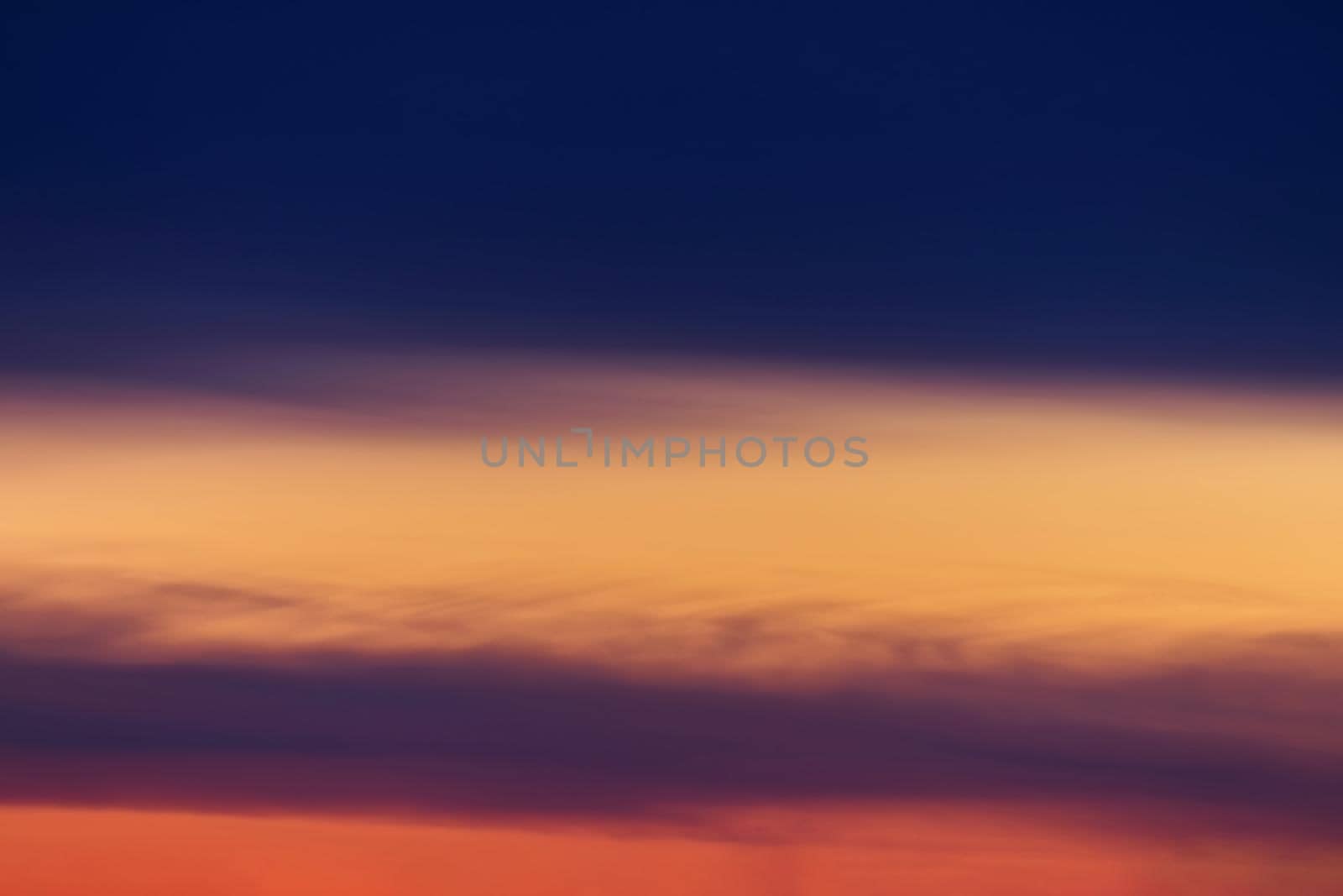 sunset sky with multicolor clouds. sky for replacement in architectural photography or 3d design.