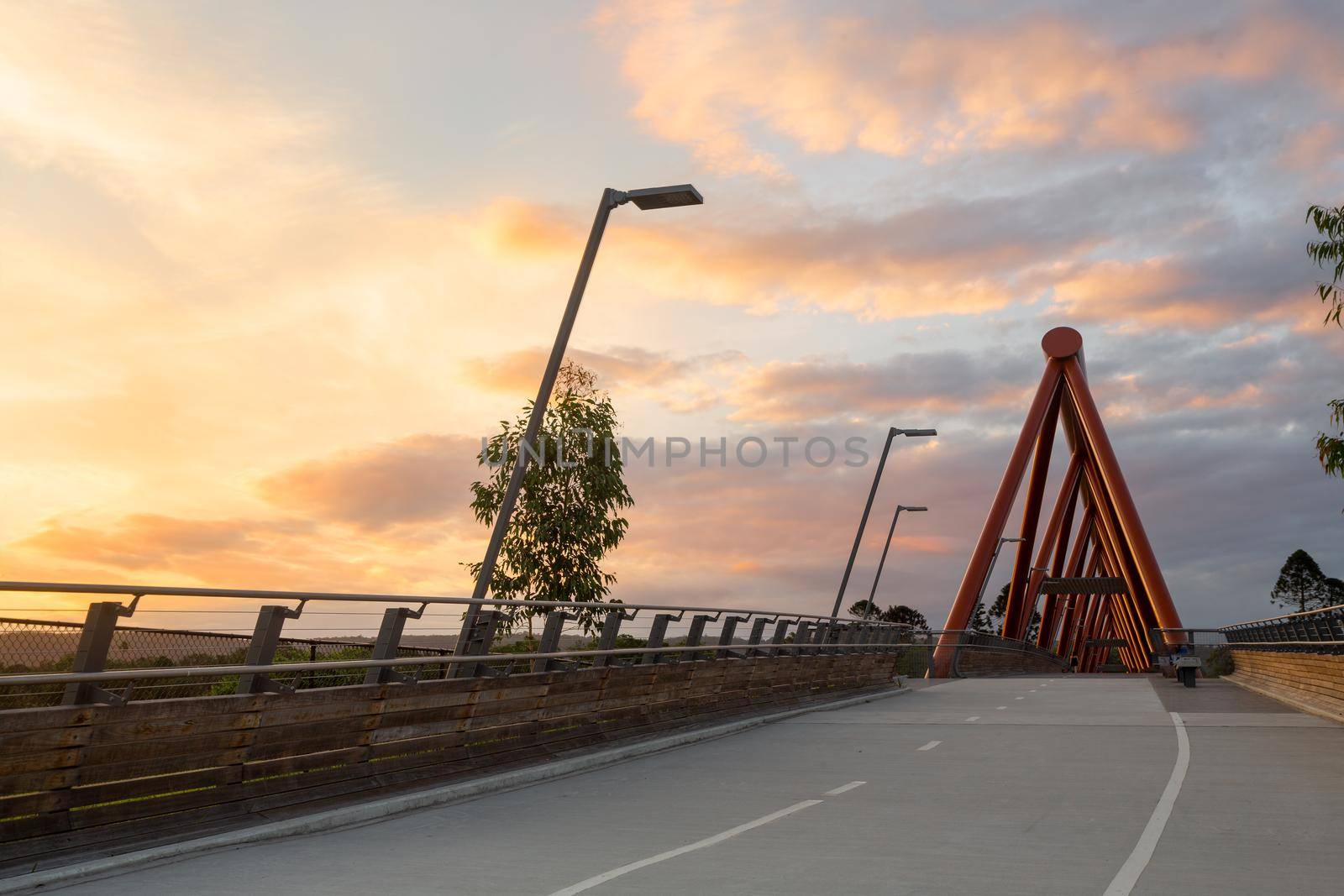 Pedestran bridge walk at sunset in Penrith NSW by lovleah