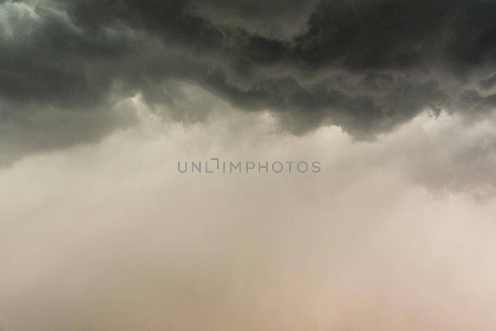 Gloomy clouds have shrouded sky before a thunderstorm.