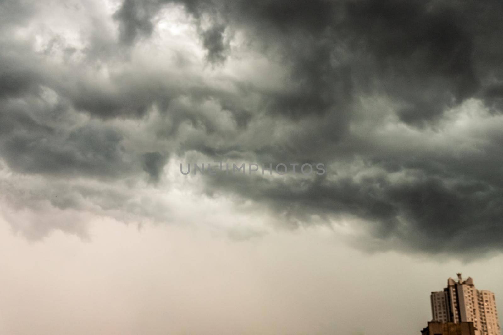 Gloomy clouds have shrouded sky before a thunderstorm.