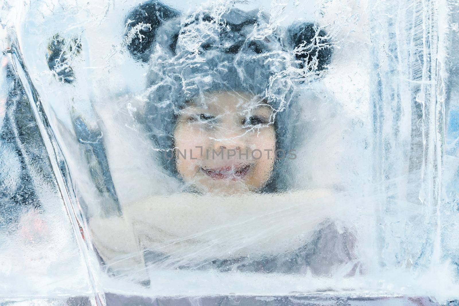 the child smiles through the ice fortress by Lena_Ogurtsova