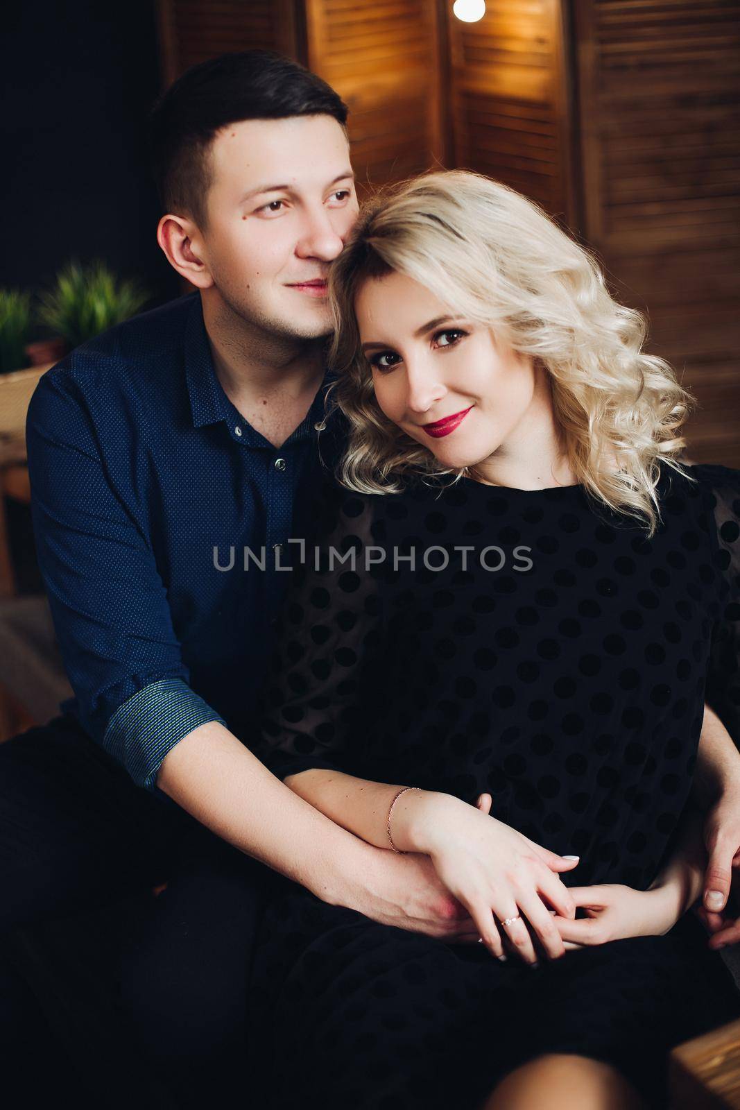 Sensual and happy couple embracing and smiling. by StudioLucky