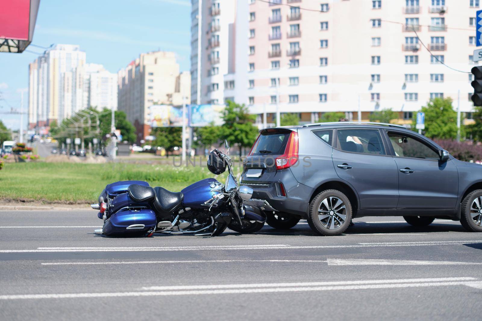 Portrait of traffic accident between electric bicycle and car, motorbike fell on asphalt, eyewitness man. Bike crashed into auto. Highway, accident concept