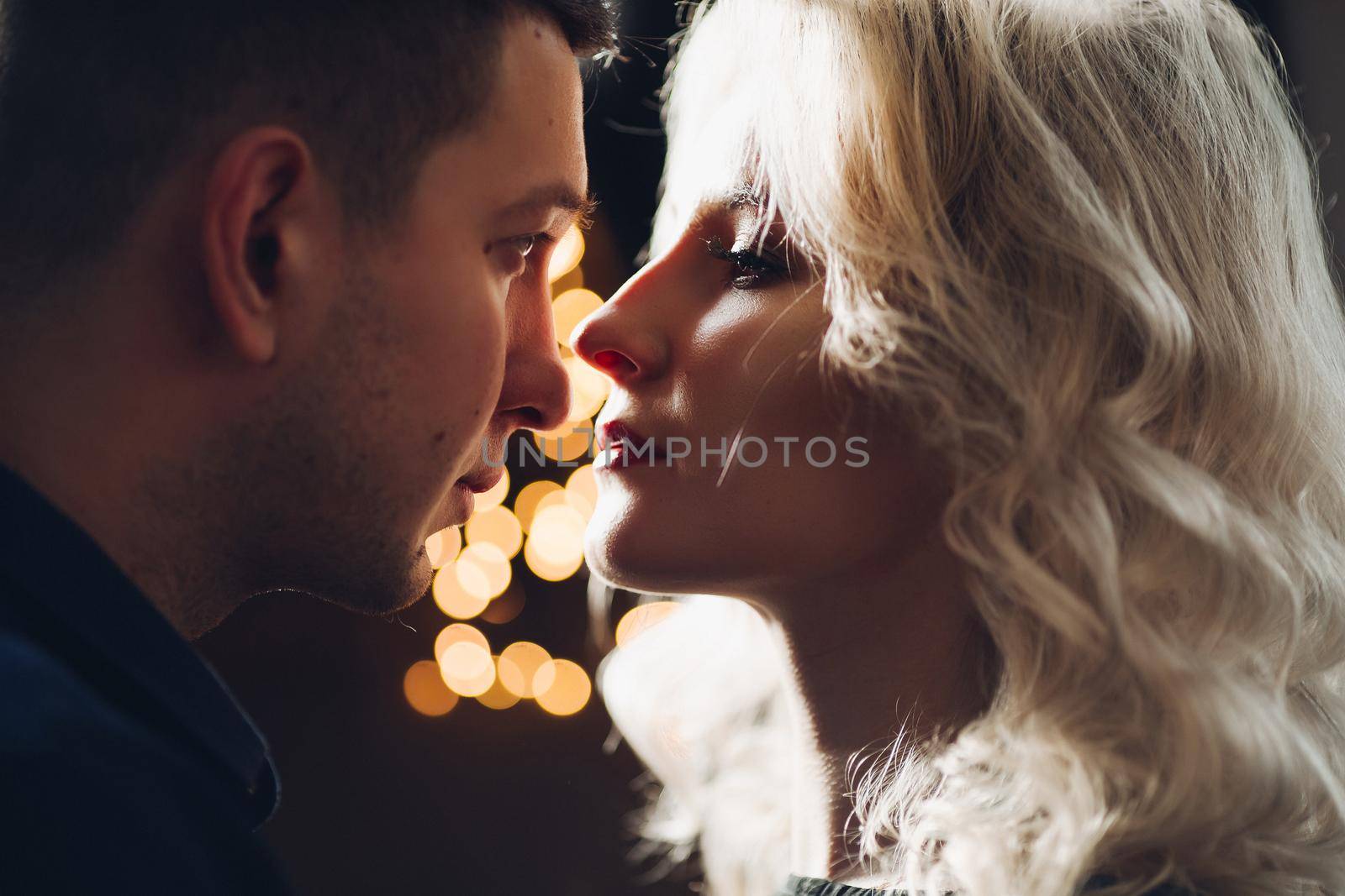 Portrait of sensual couple looking in the eye to each other. by StudioLucky