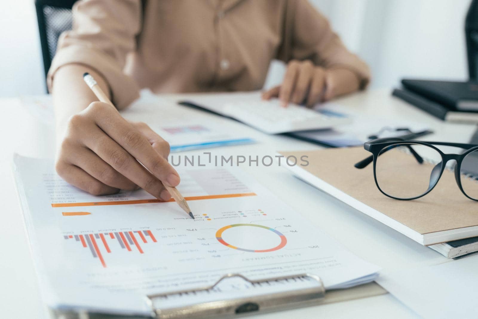 Businessman planning and analyse investment marketing data.