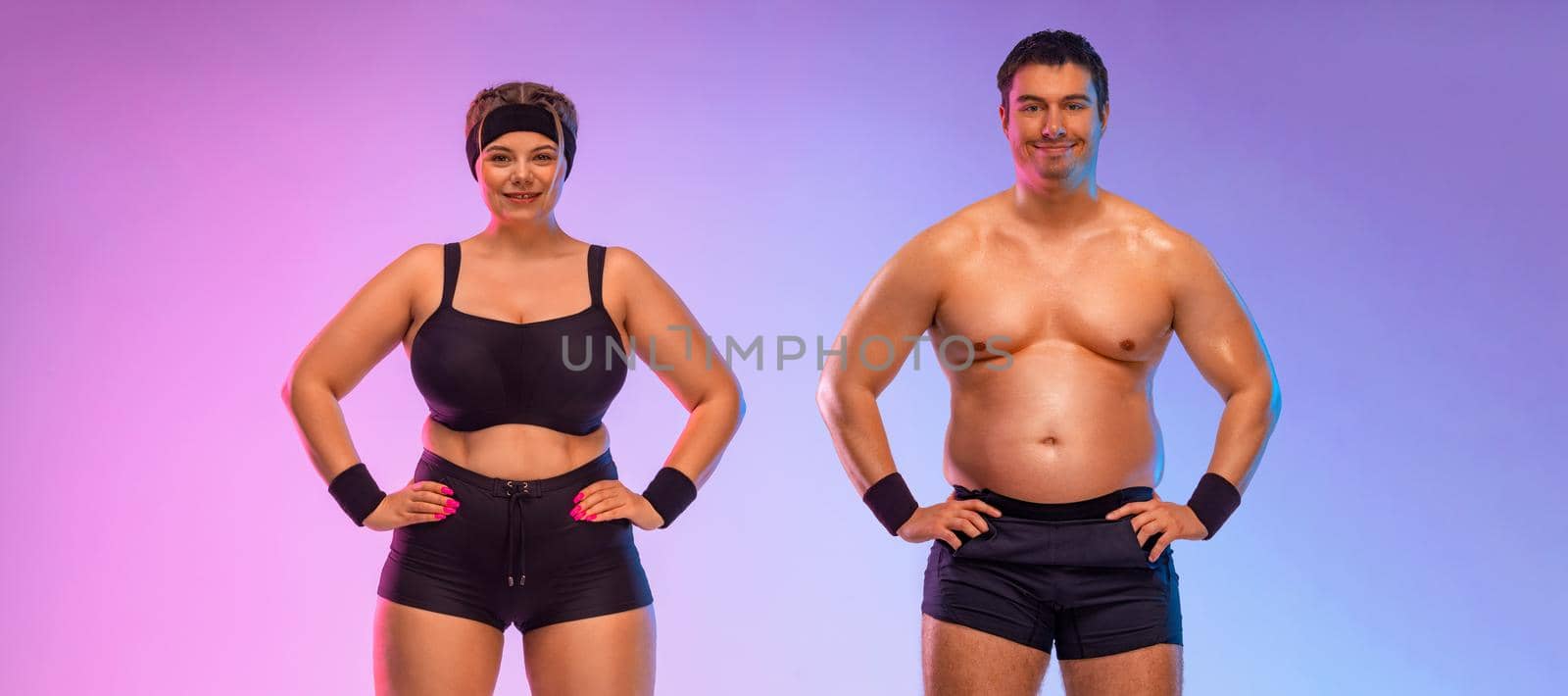 Fat man and woman in gym. Body positive and fitness concept. by MikeOrlov