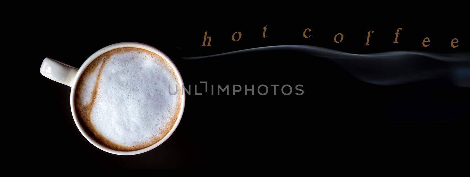 Hot milk coffee and soft froth in white ceramic cup