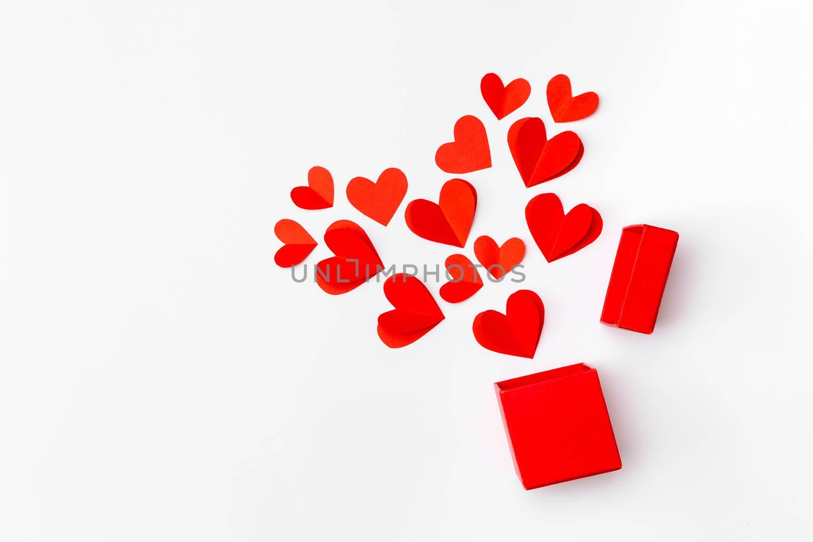 Valentine's Day background. Gifts, hearts on white. Concept of love, affection. Holiday card. Simbol of love.