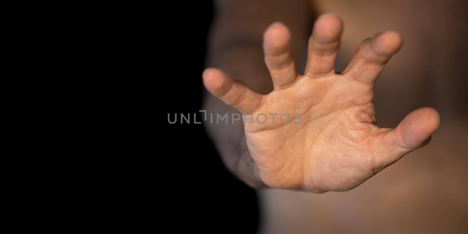 Front view of caucasian man right hand asking to be quiet symbol with text space