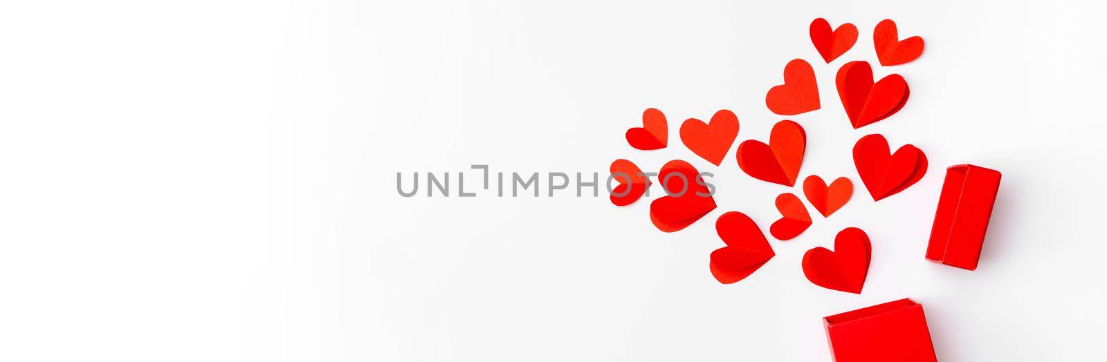 Valentine's Day background banner. Gifts, hearts on white. Concept of love, affection. Holiday card. Simbol of love.