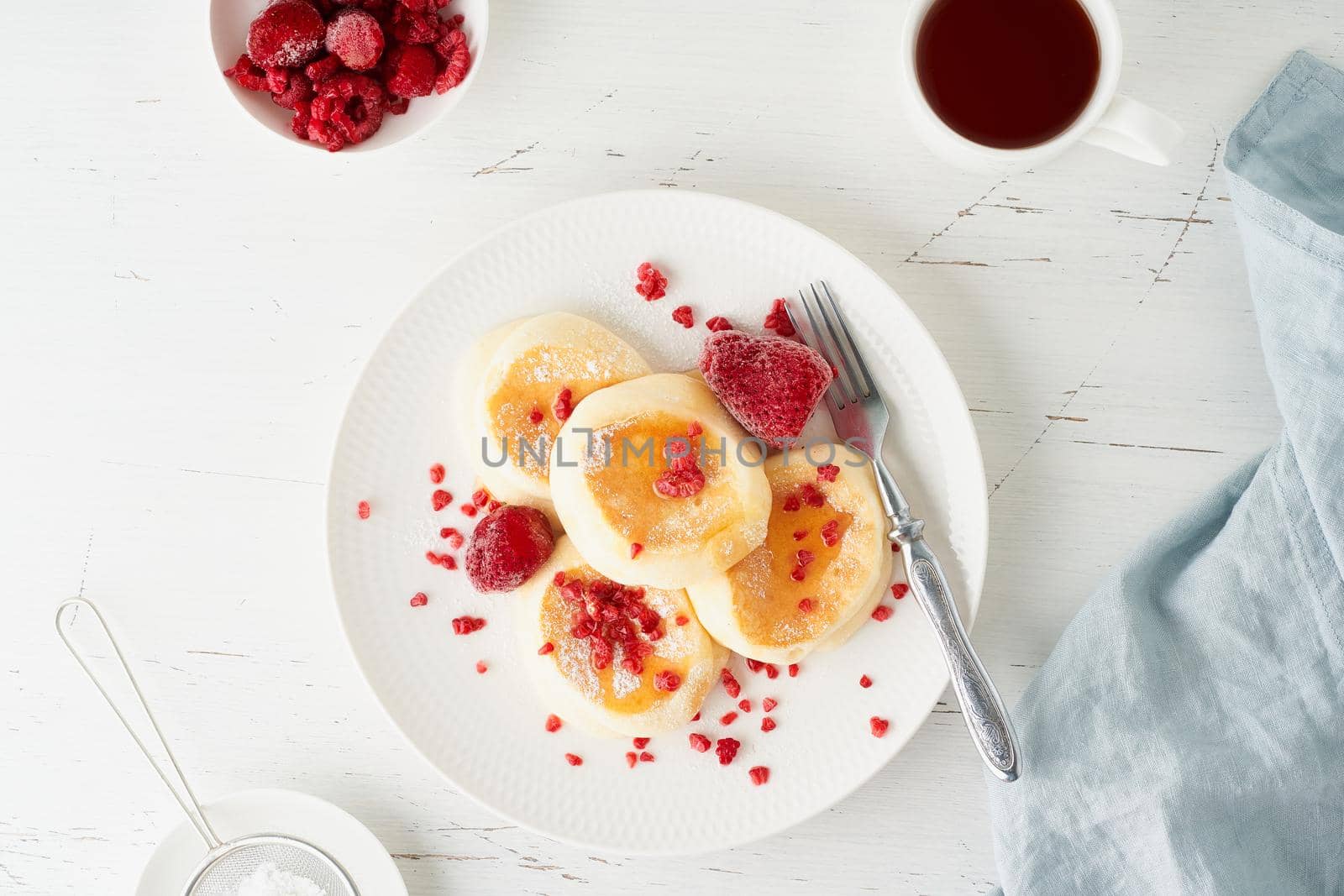 Fluffy japanese pancake, thick souffle. Trendy food. Delicious Breakfast on a white background. Top view