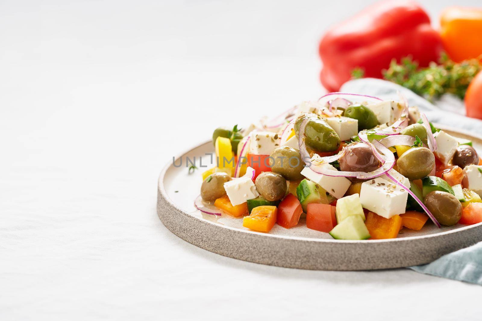 Greek village salad horiatiki with feta cheese and vegetables, vegeterian mediterranean food, low calories dieting meal. Copy space