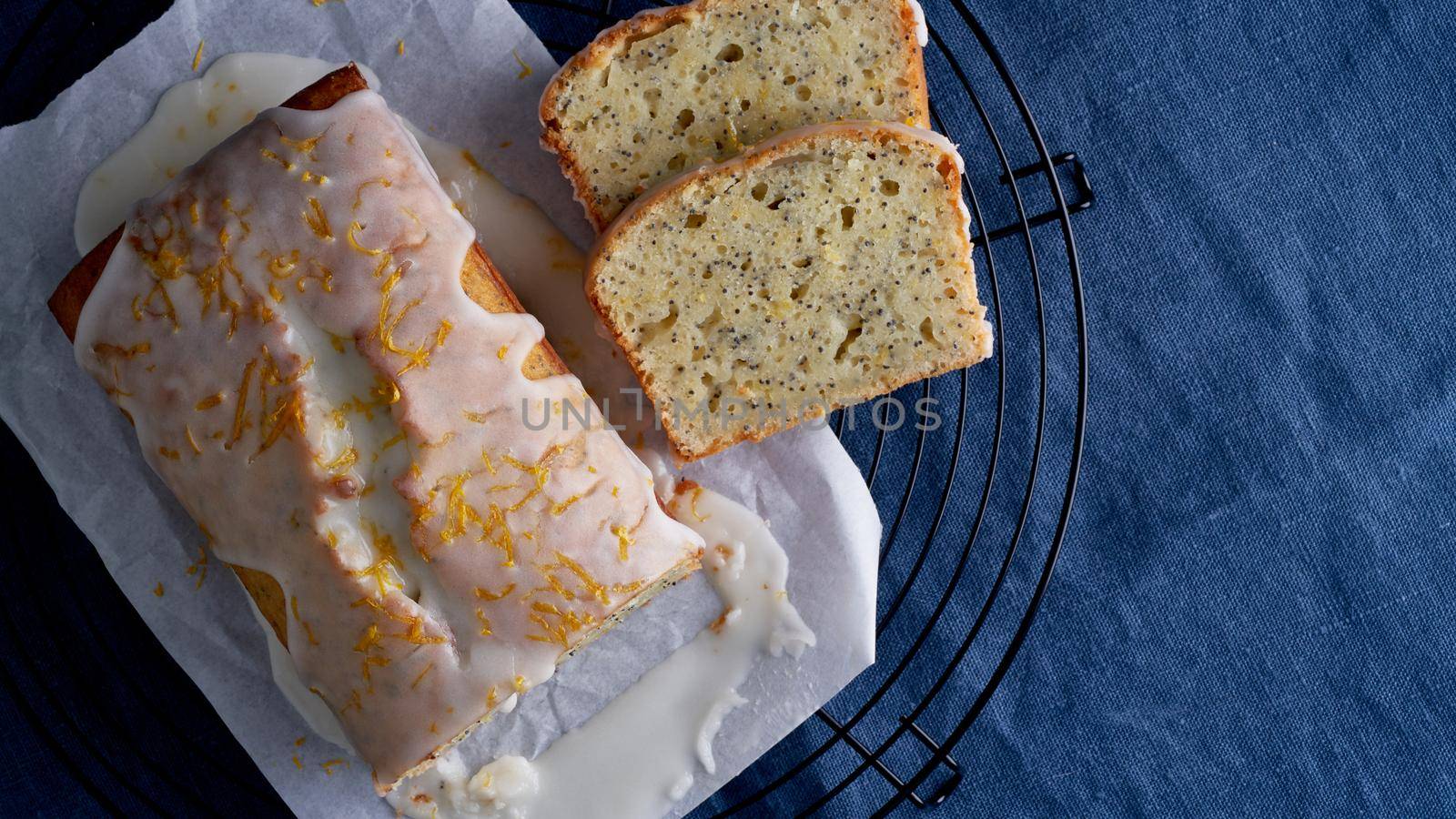 Lemon cupcake with poppy seeds. Traditional homemade cakes. Lemon bread with sugar icing by NataBene