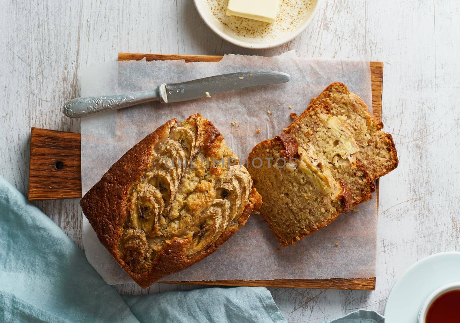Banana bread. Cake with banana, traditional american cuisine. Slice of loaf. Top view, close up.