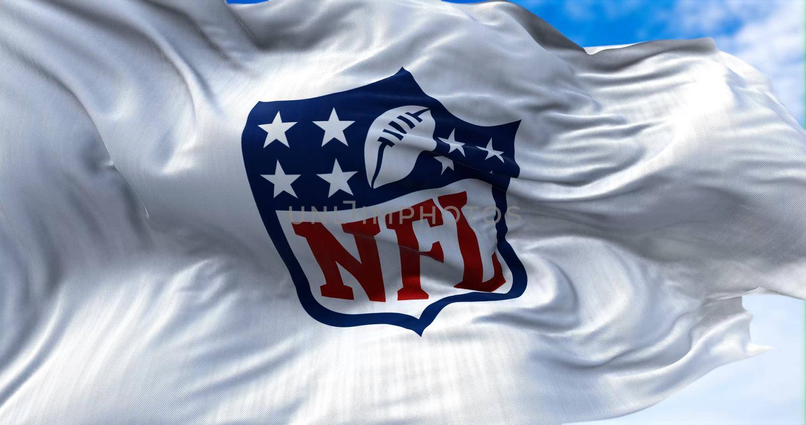 Inglewood, CA, USA, January 2022: The flag with the NFL logo waving in the wind by rarrarorro
