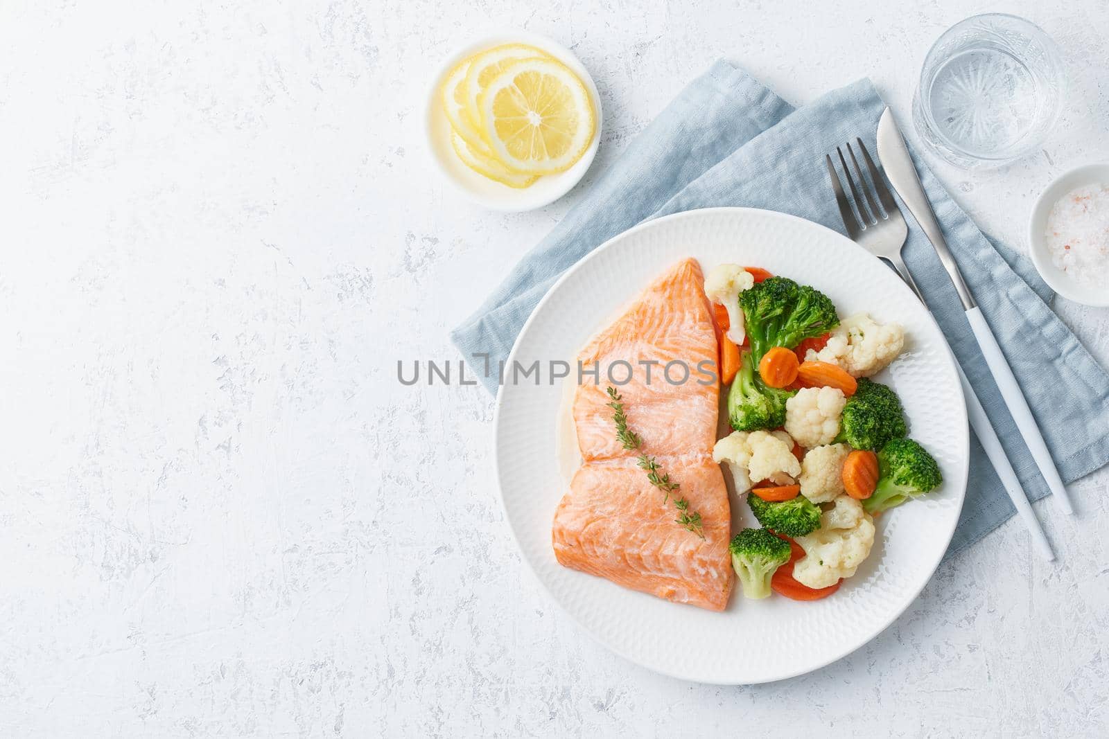 Steam salmon and vegetables, Paleo, keto, fodmap, dash diet. Mediterranean food with fish by NataBene