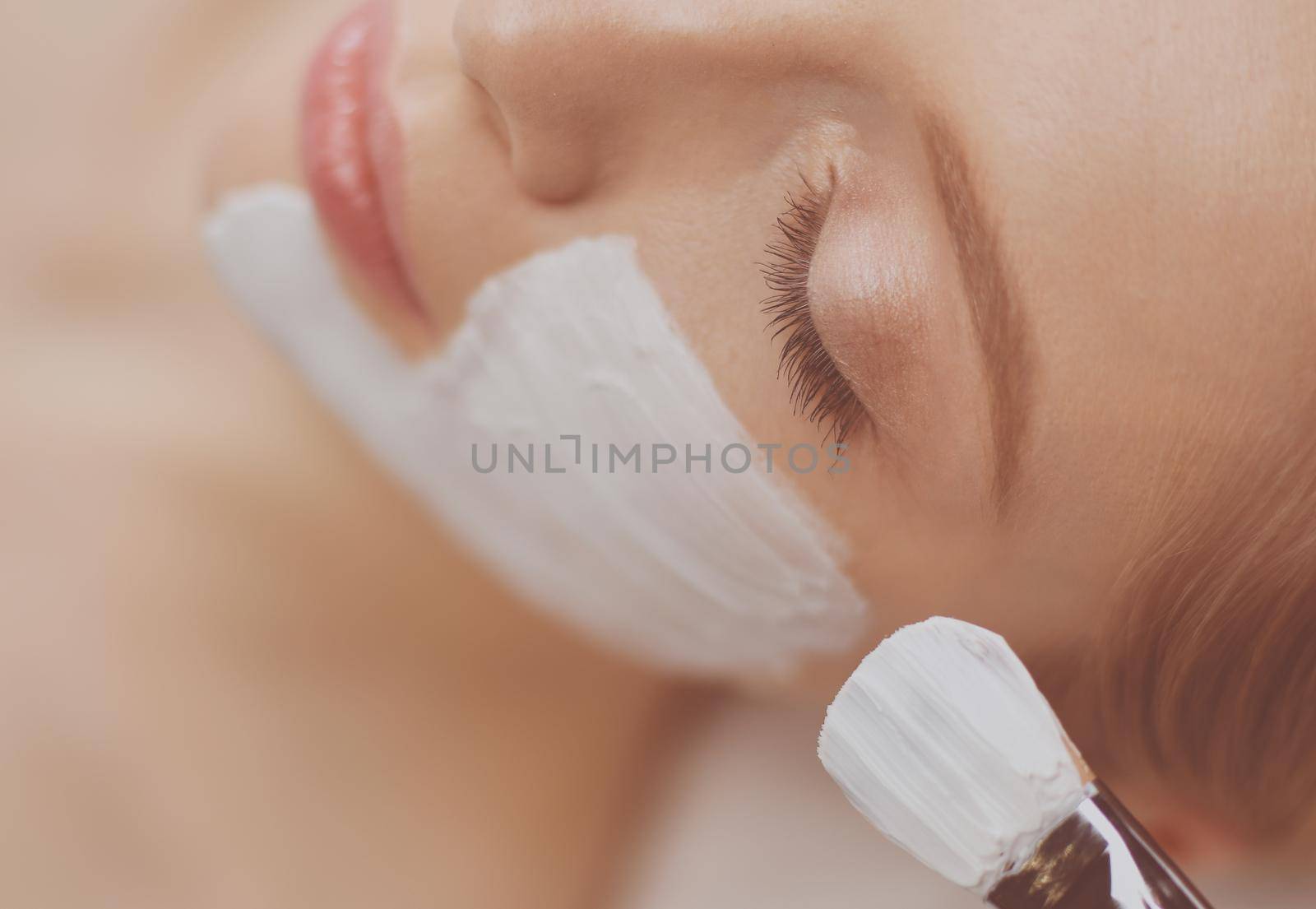 Spa facial mask application. Spa beauty organic facial mask application at day spa salon