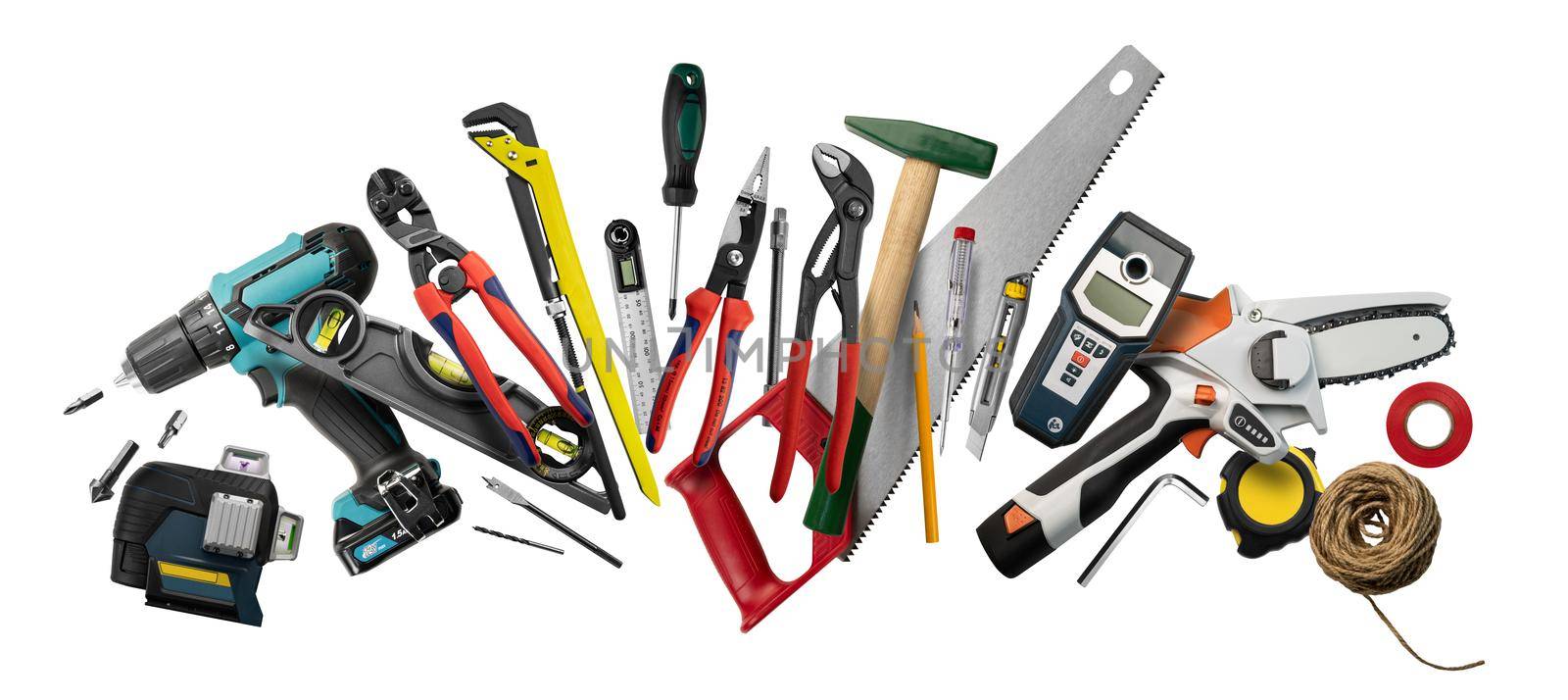 Construction tools levitate on a white background.