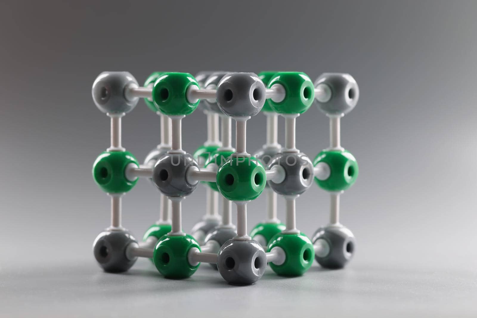 Molecular dna model structure on grey background, grey and green cells by kuprevich