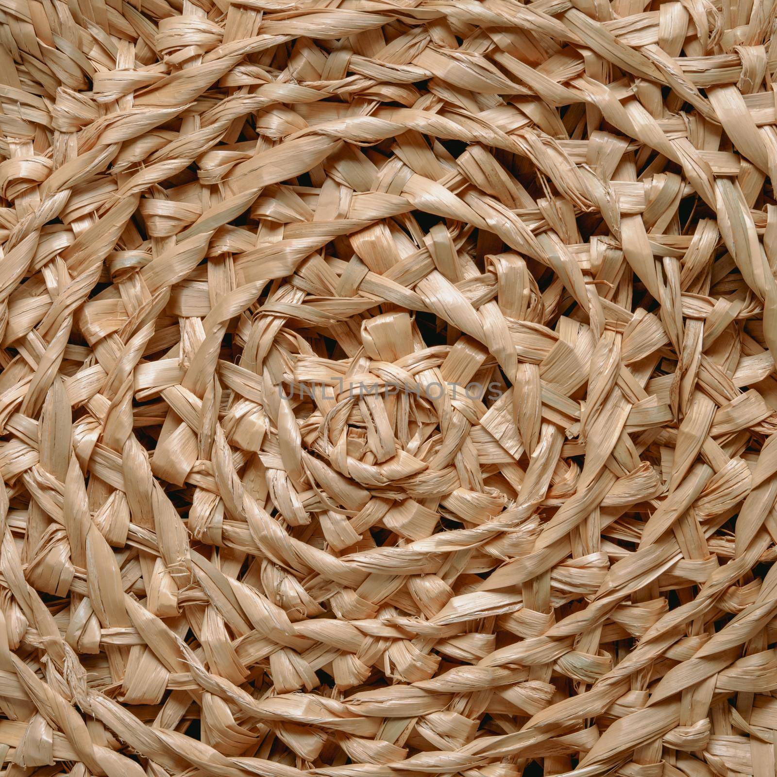 Circular pattern of woven seagrass basket by fascinadora