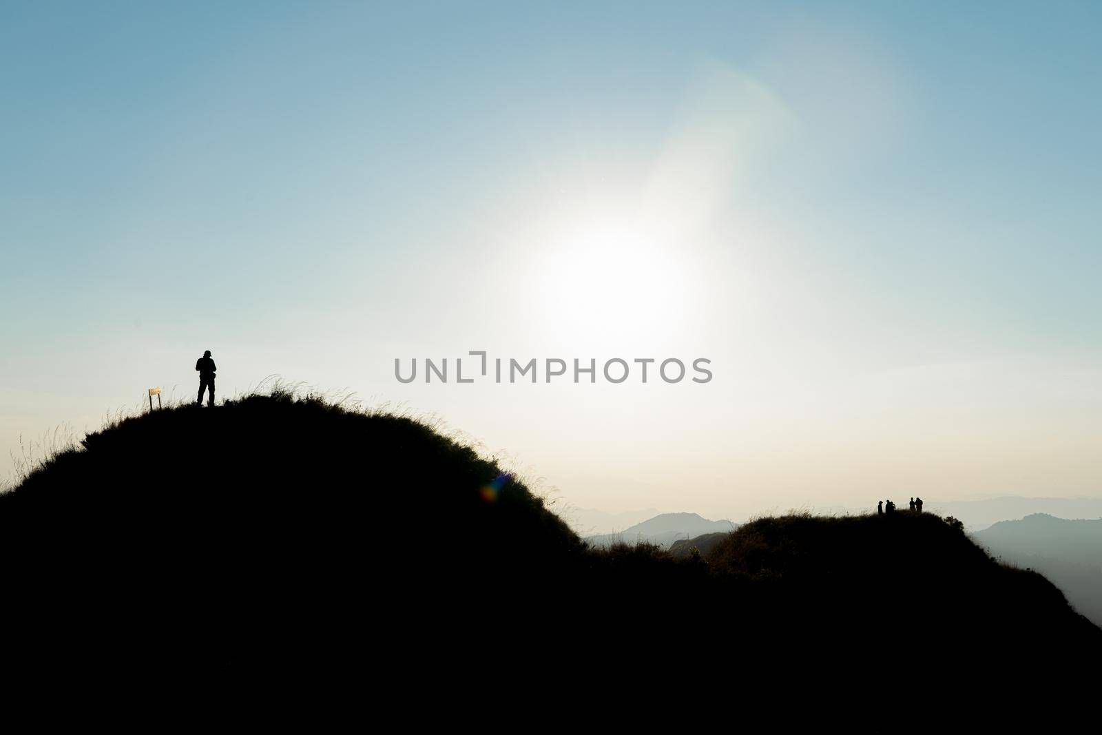 Silhouette traveler on big mountain at Thailand
