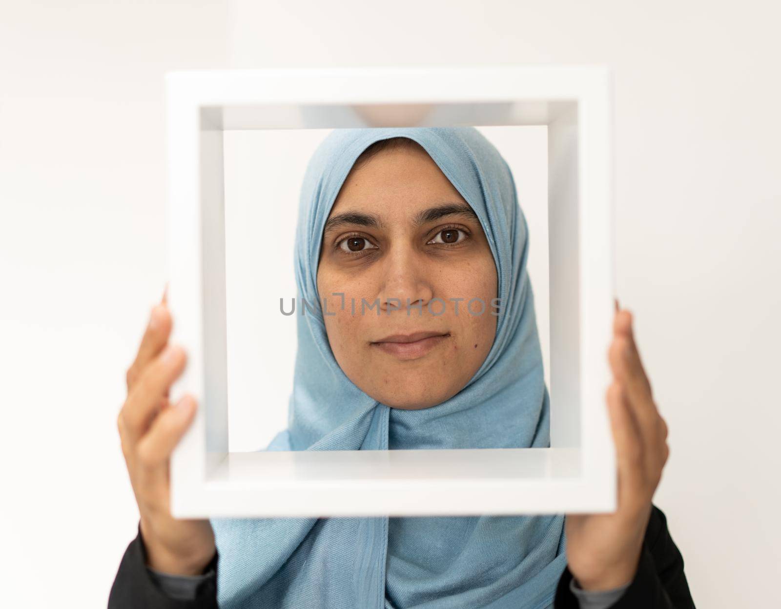 Pretty Muslim Arabic woman with a frame by Zurijeta