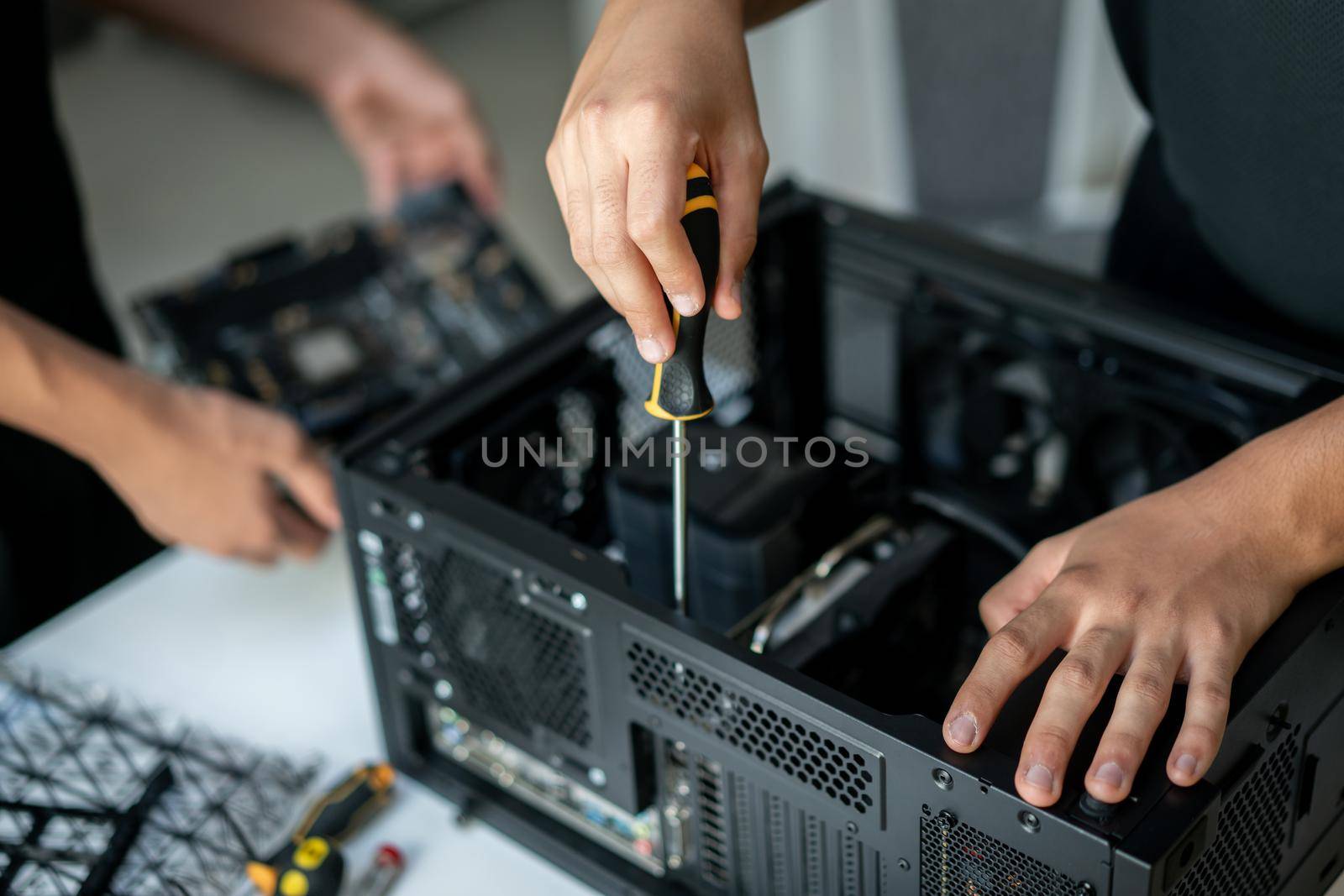 Repair of the computer system unit in the service center. High quality photo