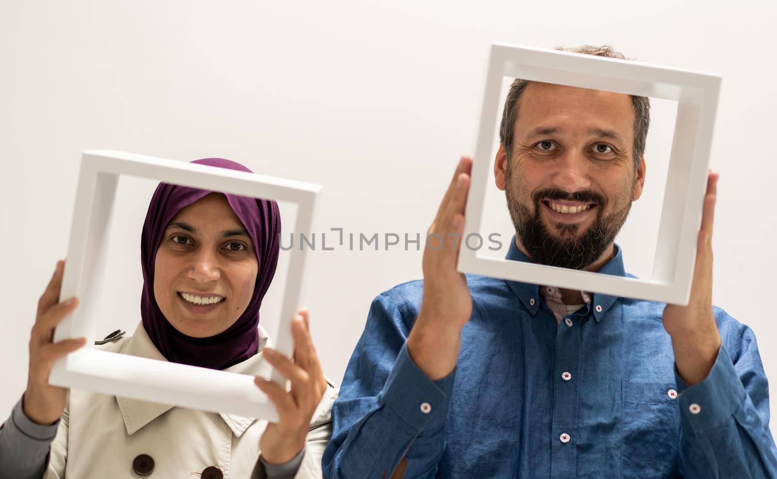 Muslim Arabic couple, man and woman with a frame by Zurijeta