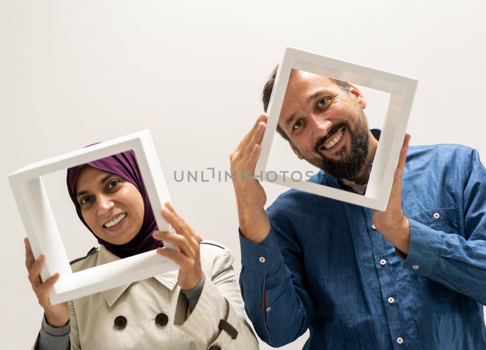 Muslim Arabic couple, man and woman with a frame by Zurijeta